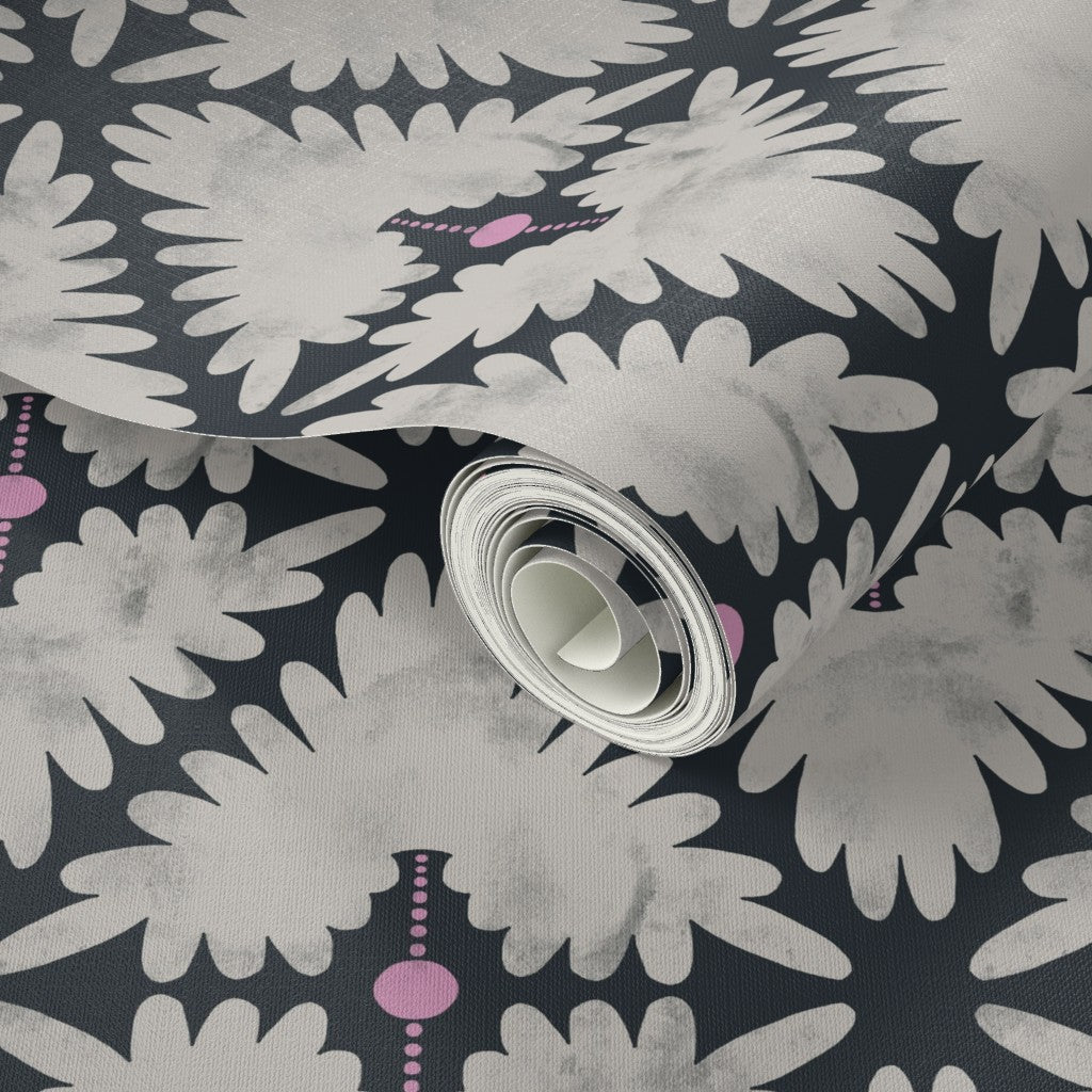 Roll of black and white floral-patterned wallpaper. Designed by artist Leila Simon Hayes.