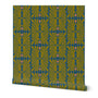 A roll of patterned wallpaper with green and pink design on a blue background. Designed by artist Leila Simon Hayes. 