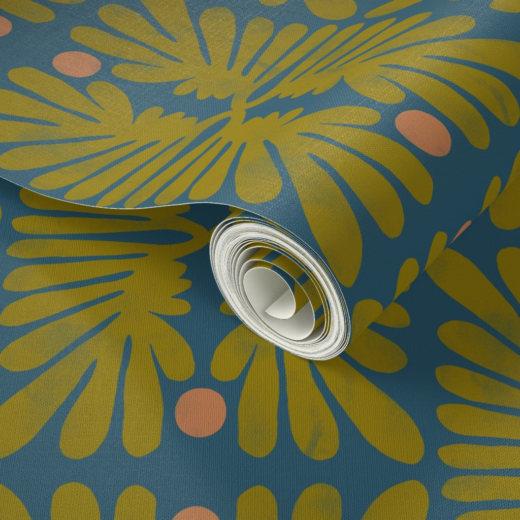 Roll of wallpaper with a floral green pattern on a blue background. Designed by artist Leila Simon Hayes. 