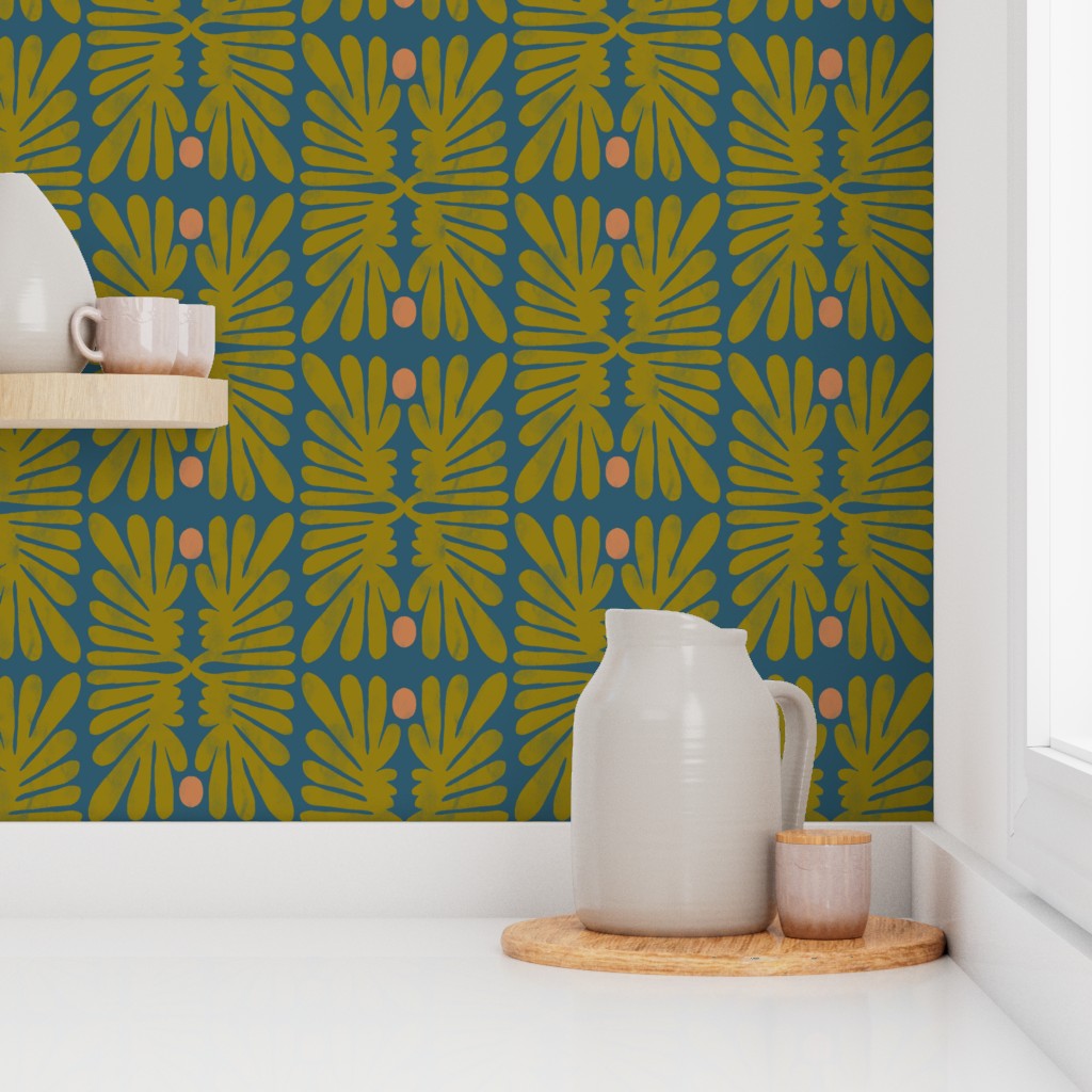 A kitchen countertop against a patterned green and blue floral wallpaper backsplash. Designed by artist Leila Simon Hayes. 