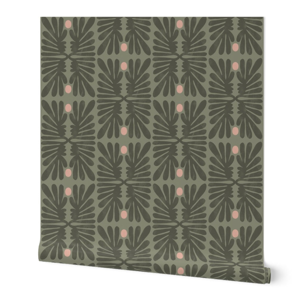 Roll of olive green wallpaper with a green floral pattern on a white background. Designed by artist Leila Simon Hayes. 