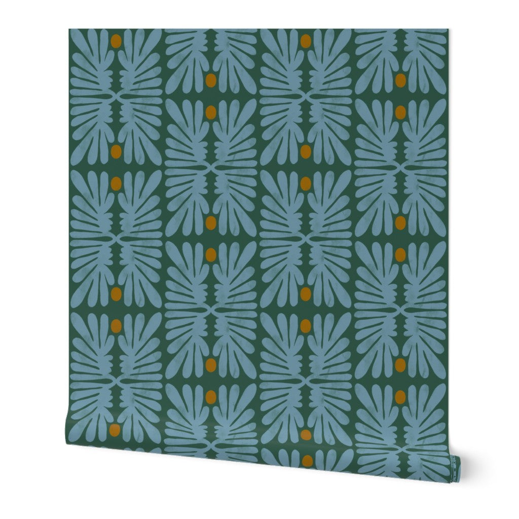 Roll of wallpaper with a blue leaf pattern on a green background. Designed by artist Leila Simon Hayes. 