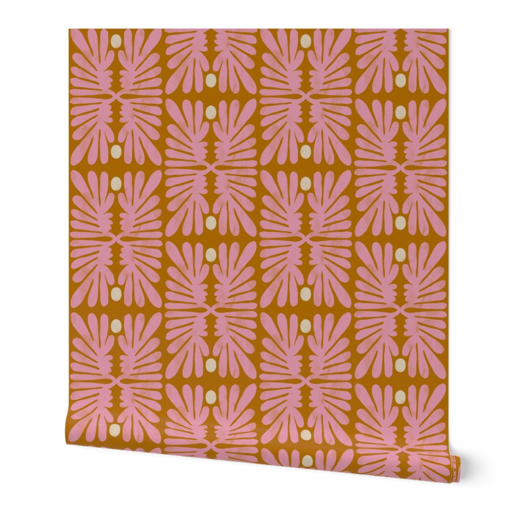 Roll of wallpaper with pink floral leaf pattern on a brown background. Designed by artist Leila Simon Hayes. 