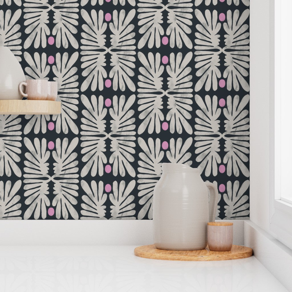 Floral black and white wallpaper with leaf pattern in a kitchen with a wooden shelf and ceramic items. Designed by artist Leila Simon Hayes. 