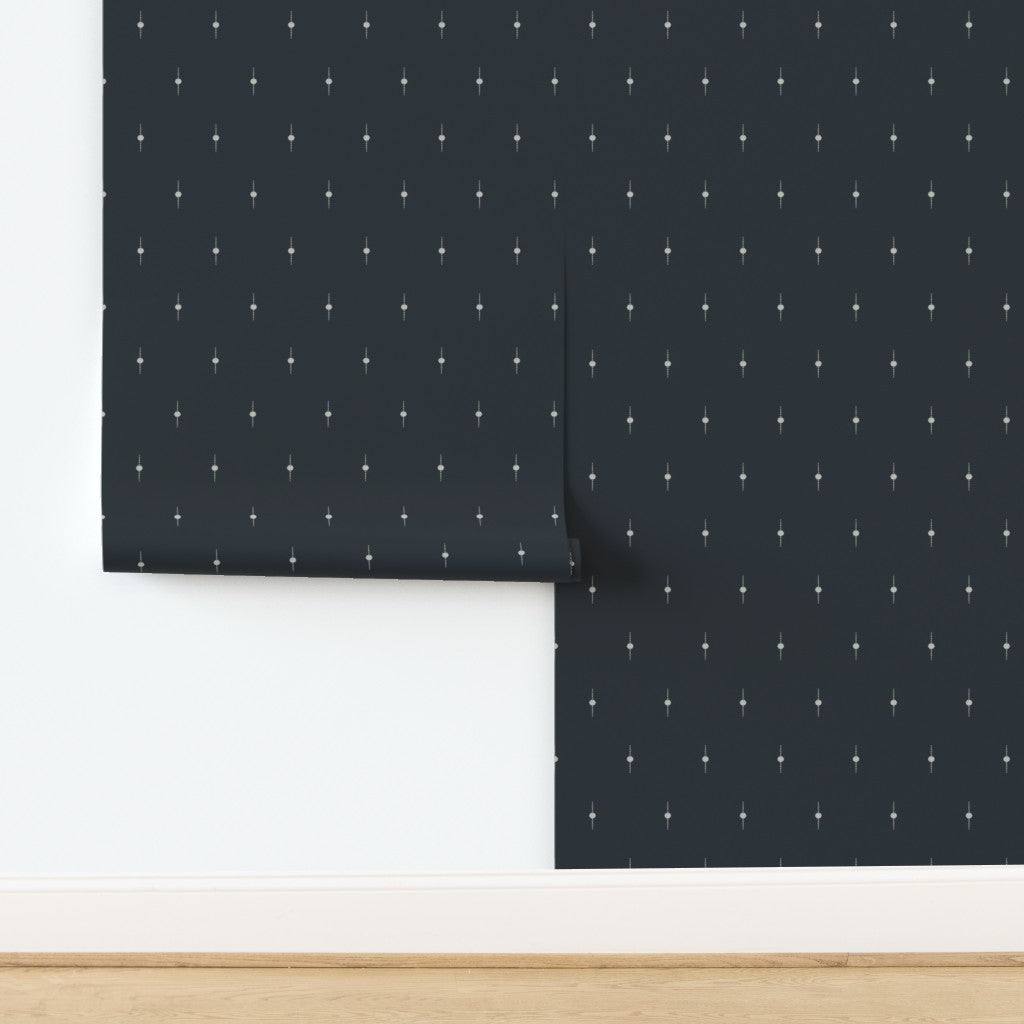 Patterned wallpaper with geometric star design on a white background. Designed by artist Leila Simon Hayes. 