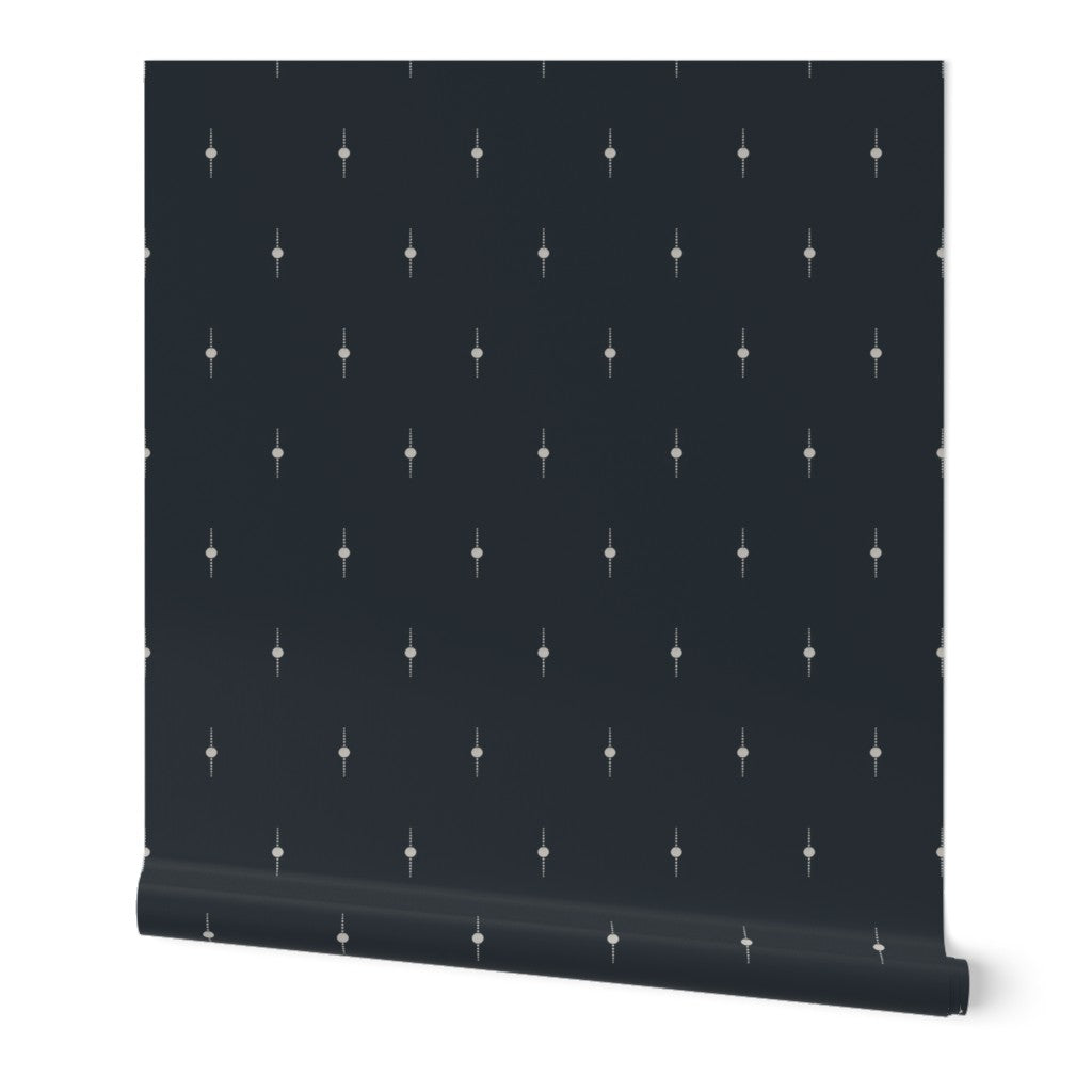 Patterned roll of wallpaper with subtle geometric star design on a white background. Designed by artist Leila Simon Hayes. 