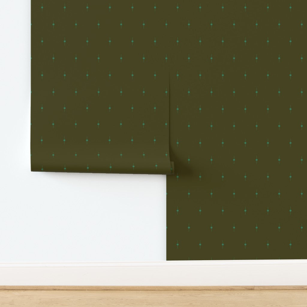 Patterned green wallpaper with geometric star design on a white background. Designed by artist Leila Simon Hayes. 