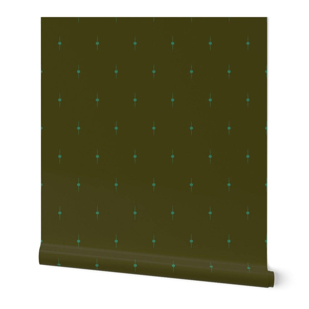Patterned green roll of wallpaper with geometric design on a white background. Designed by artist Leila Simon Hayes. 