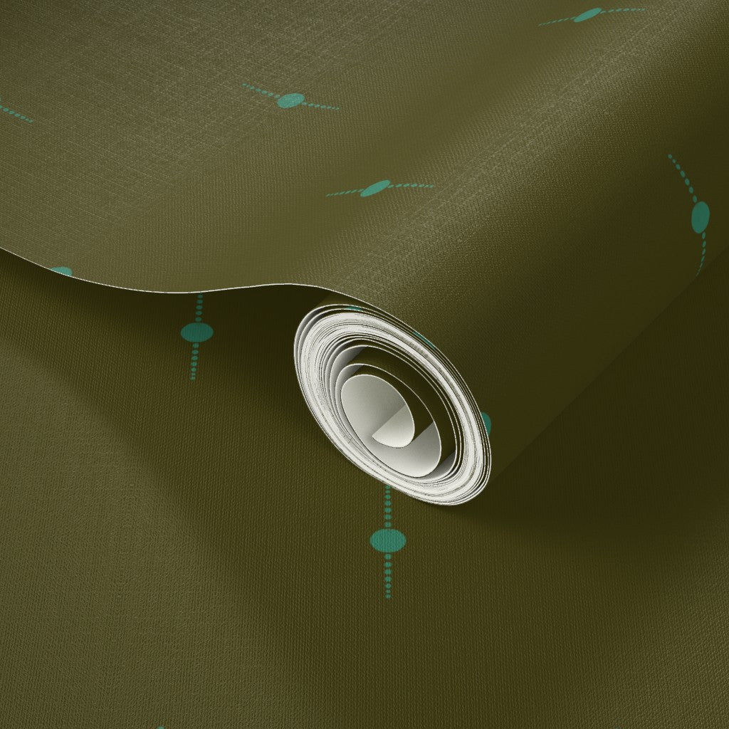 Roll of green wallpaper with a subtle geometric star pattern. Designed by artist Leila Simon Hayes. 