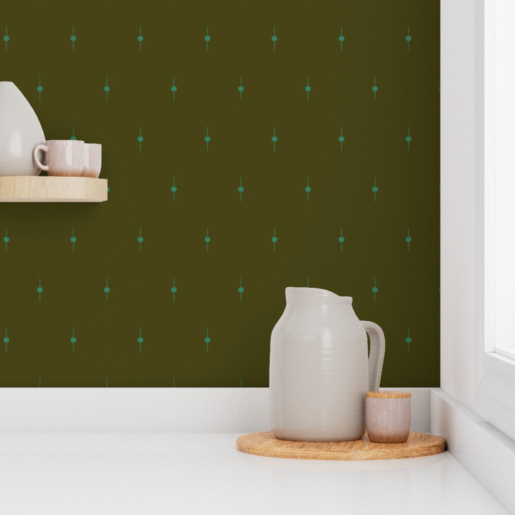 Kitchen countertops against a green patterned wall. Designed by artist Leila Simon Hayes. 