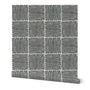 Patterned rug with black lines on a white background. Designed by artist Leila Simon Hayes. 