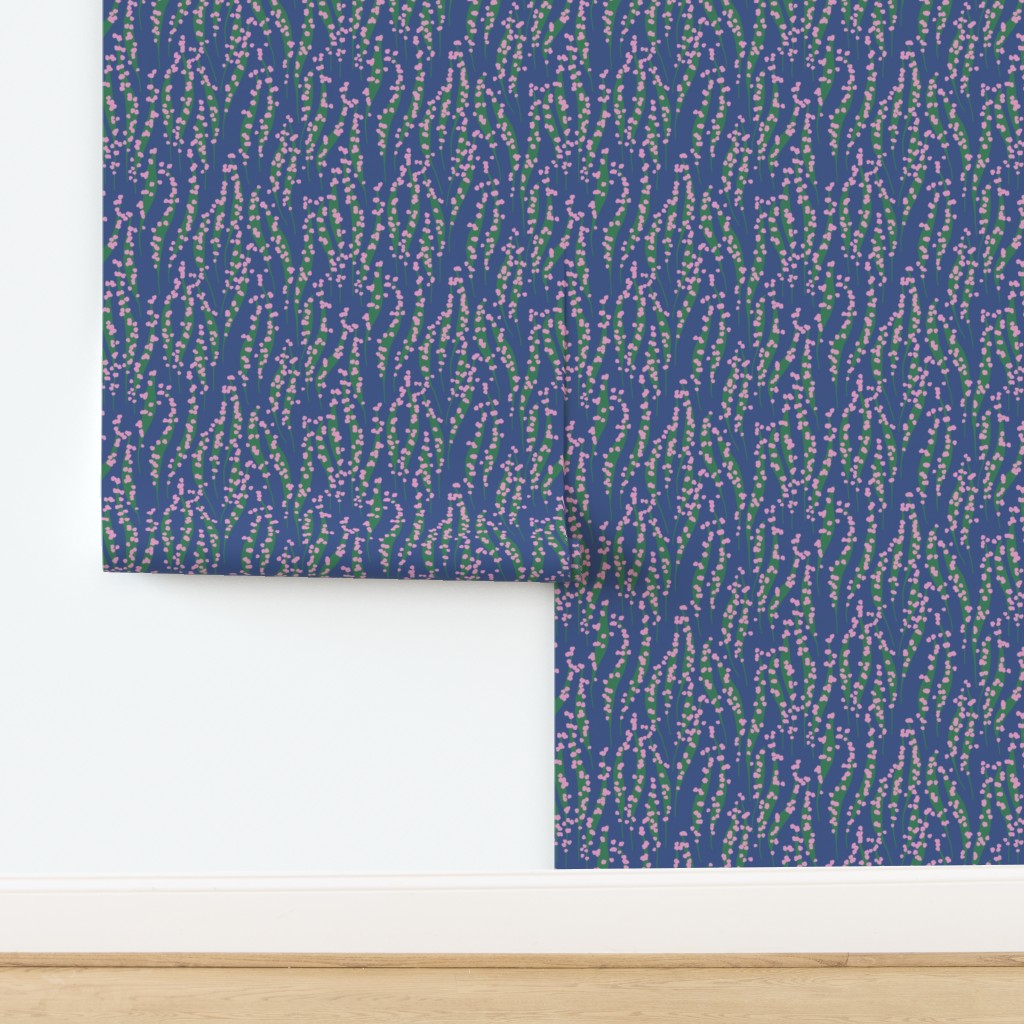 Blue wallpaper with a subtle pattern on a white background. Designed by Leila Simon Hayes. 