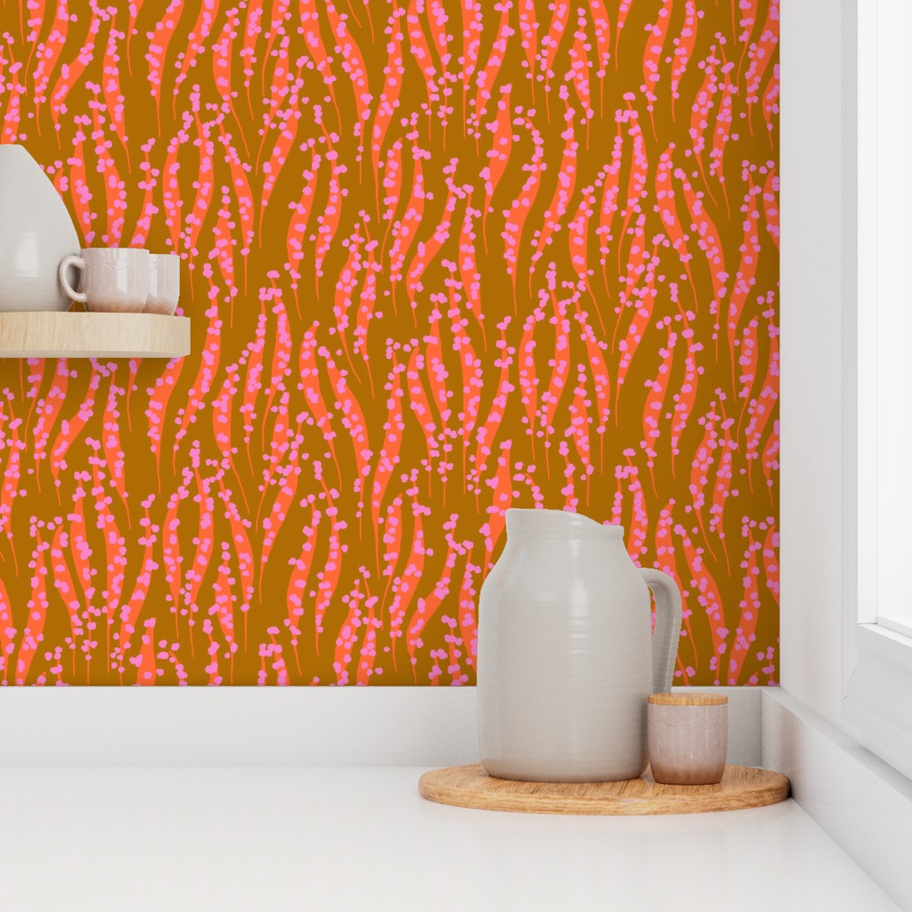 White pitcher and cup on a wooden tray against a wall with pink and orange abstract pattern. Designed by artist Leila Simon Hayes. 