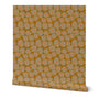 Roll of wallpaper with a floral pattern on a white background. Designed by artist Leila Simon Hayes.