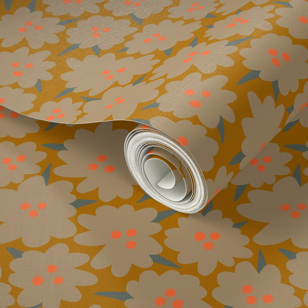 Roll of yellow floral-patterned wallpaper with flowers and dots on a yellow background. Designed by artist Leila Simon Hayes.