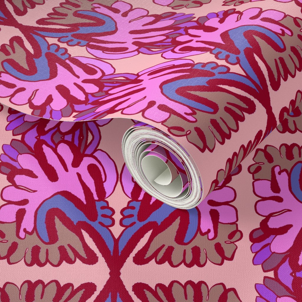 Roll of pink and blue patterned paper with a close-up view. Designed by artist Leila Simon Hayes.