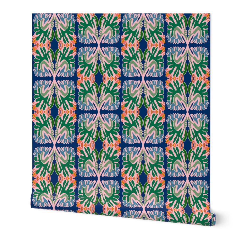 Colorful patterned roll of wallpaper with green, blue, and pink design on a white background. Designed by artist Leila Simon Hayes. 