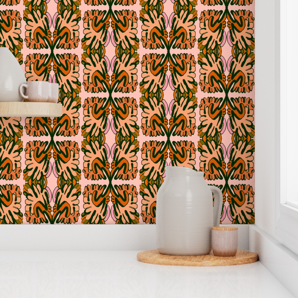 Kitchen counter with a patterned wall, white pitcher, and wooden cutting board. Designed by artist Leila Simon Hayes. 