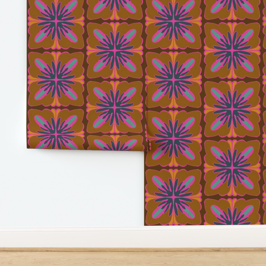 A folded sheet of wallpaper with a retro 1970s-style geometric pattern, displayed on a white wall above a light wood floor. Designed by artist Leila Simon Hayes.