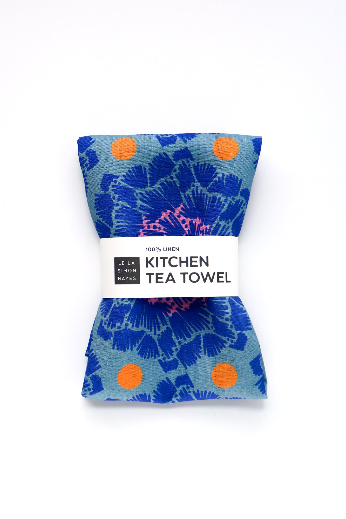 Blue floral kitchen tea towel with orange dots on a white background. Designed by artist Leila Simon Hayes.