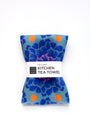 Blue floral kitchen tea towel with orange dots on a white background. Designed by artist Leila Simon Hayes.