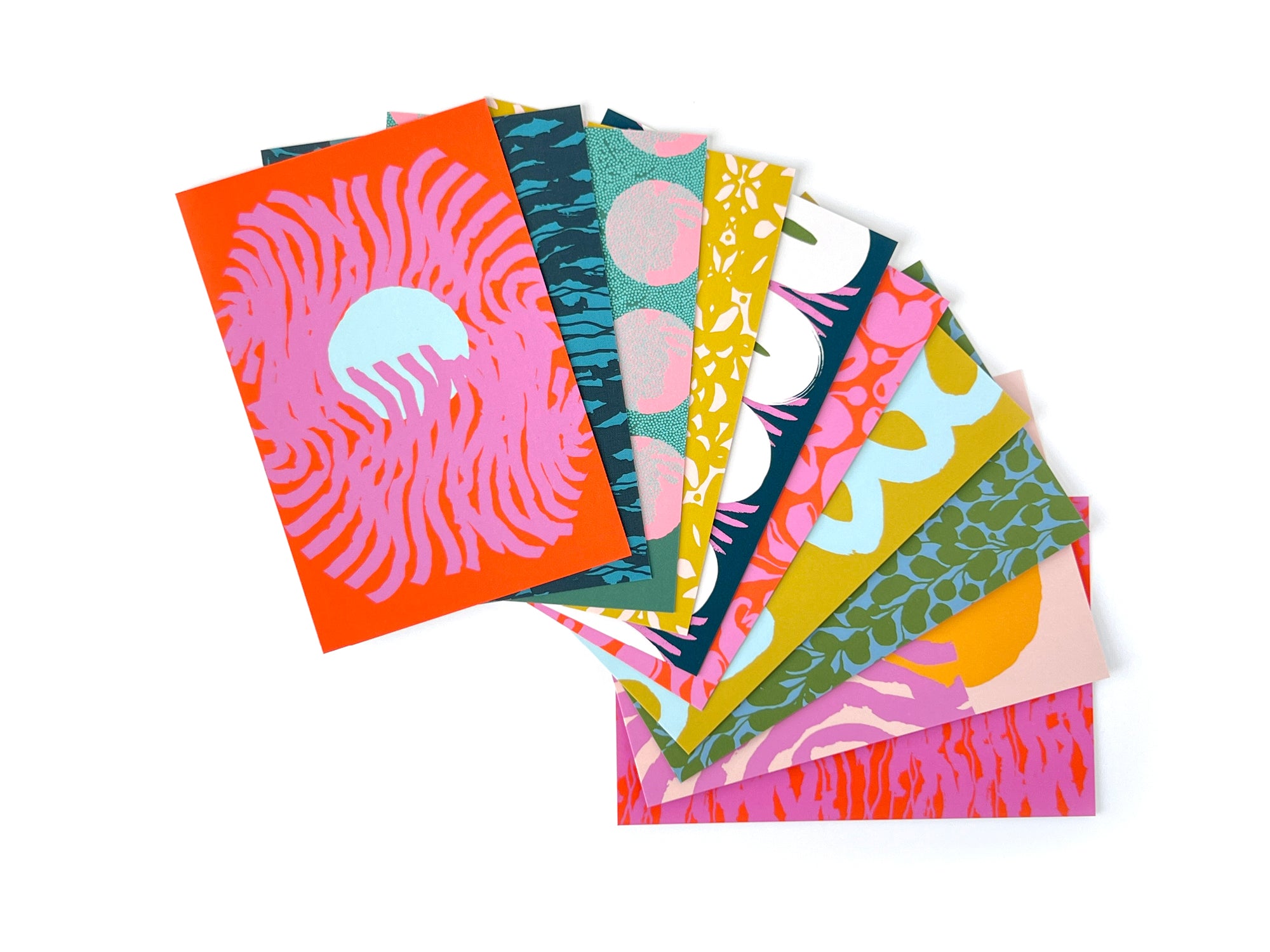10 colorful and abstract postcards, designed by artist Leila Simon Hayes.
