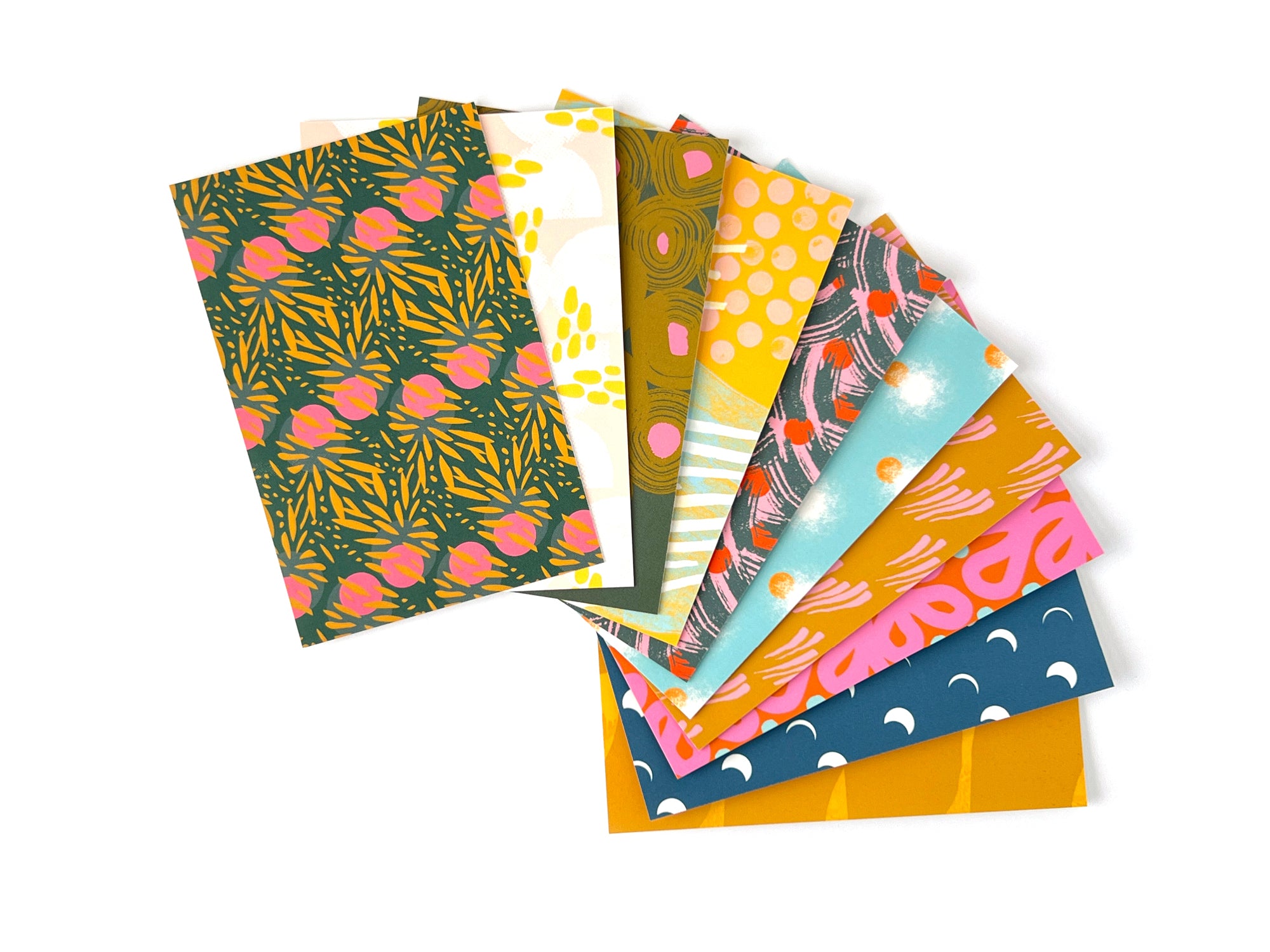 Set of 10 colorful patterned postcards on a white background, designed by artist Leila Simon Hayes.