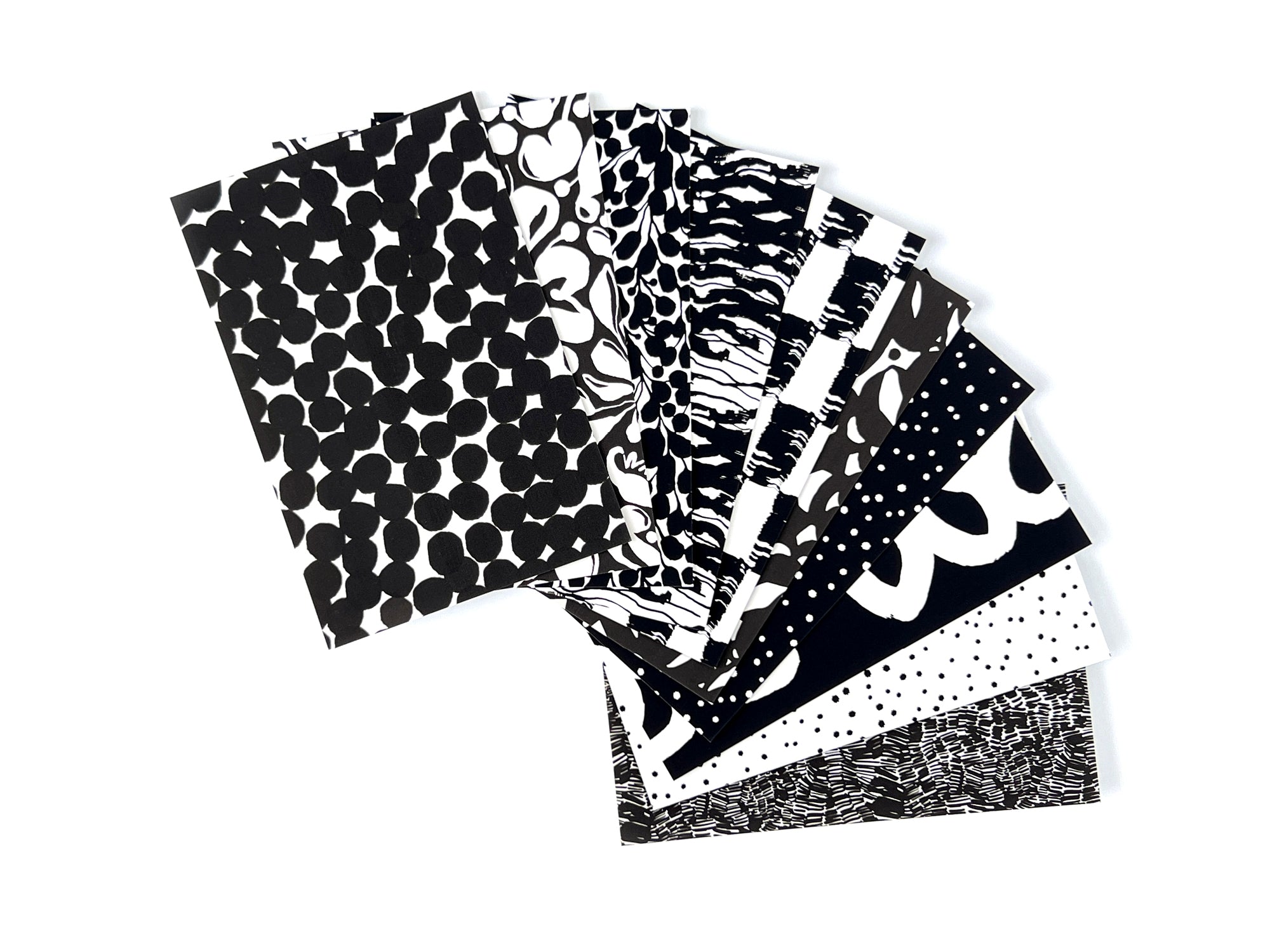 10 postcards in black and white with a variety of patterns, designed by artist Leila Simon Hayes.