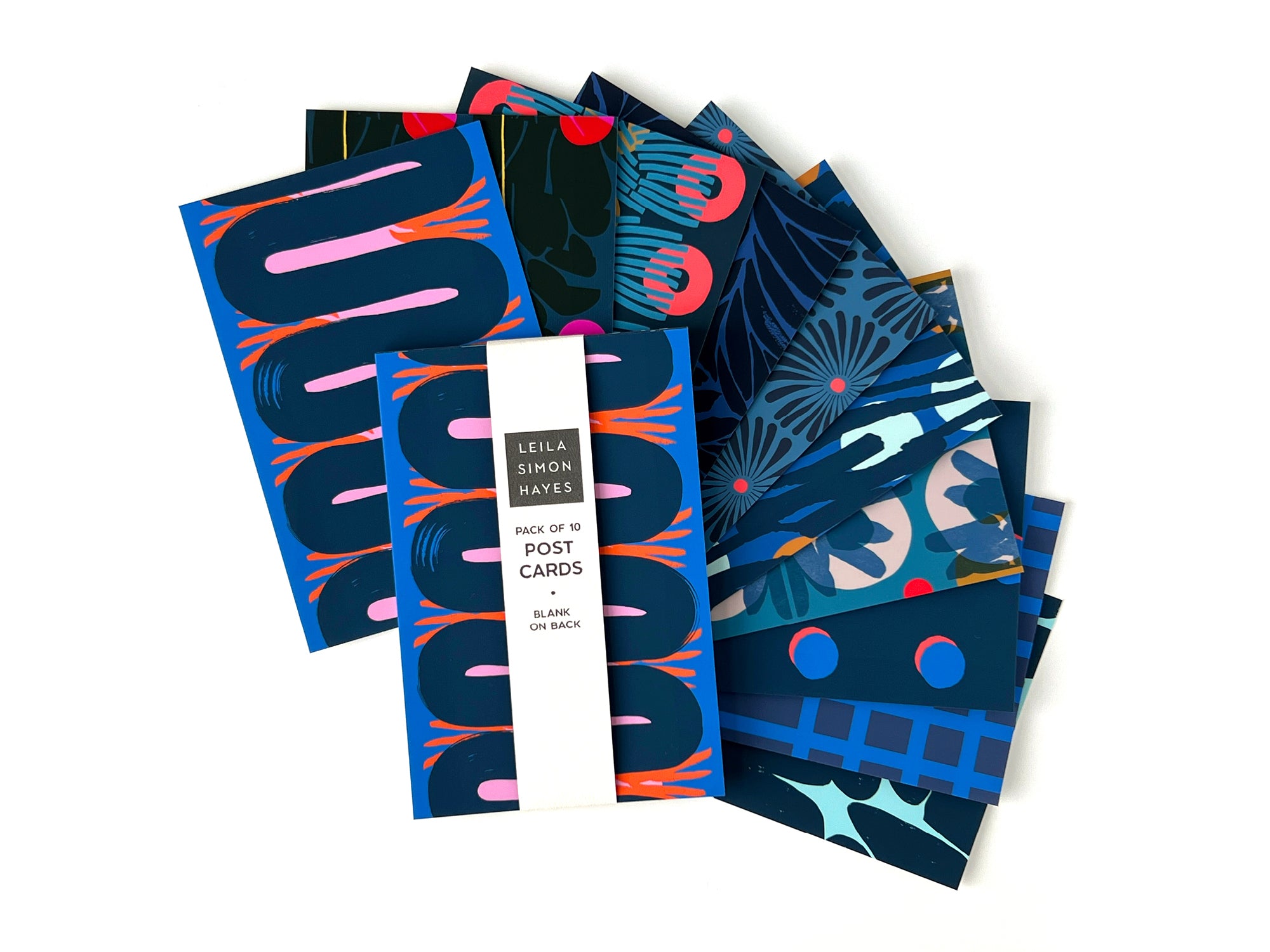 Pack of 10 colorful, blue-themed postcards with various designs on the front and a blank back for writing. Designed by artist Leila Simon Hayes.