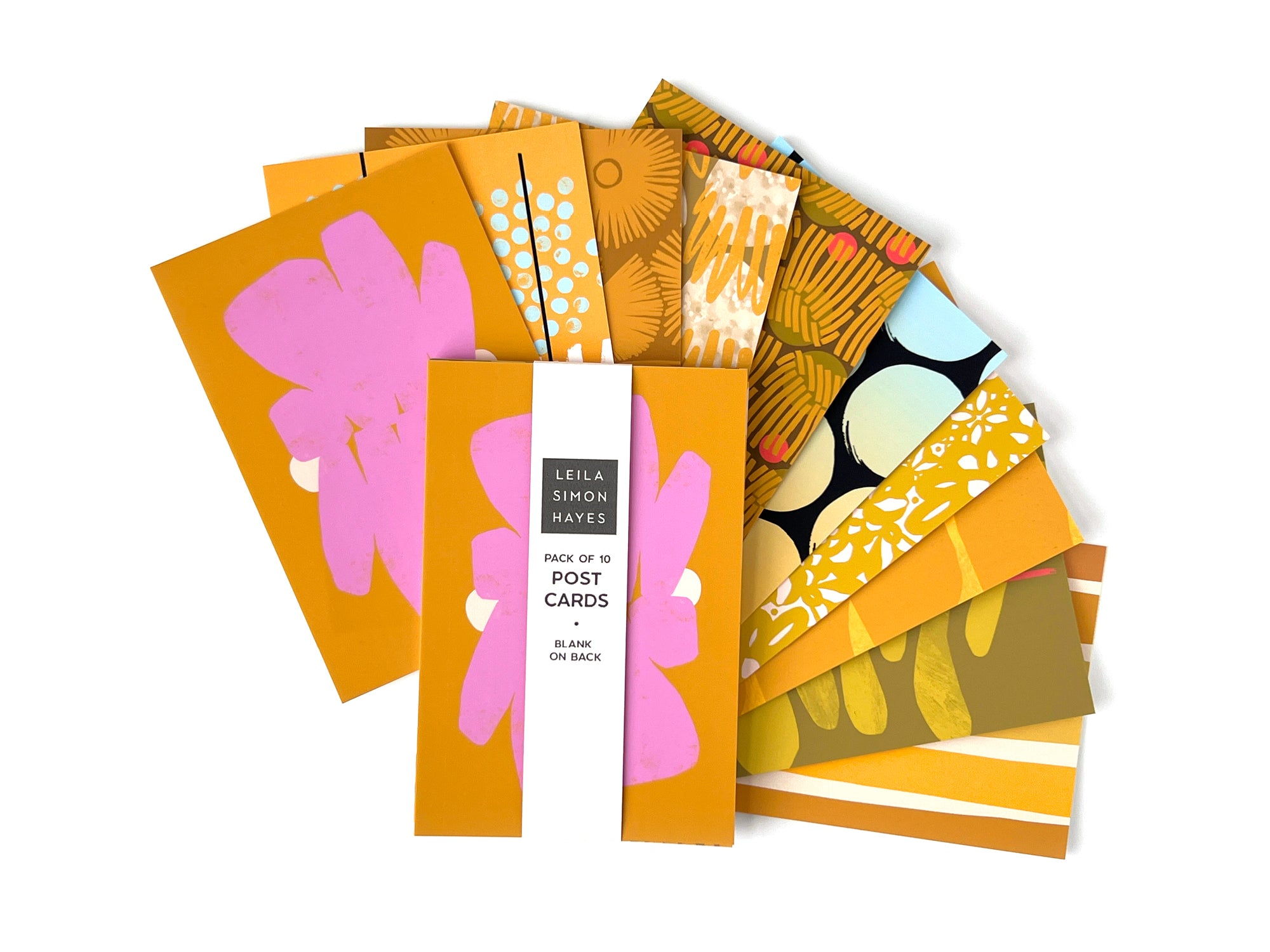 Pack of 10 colorful, yellow-themed greeting cards with various designs on the front and a blank space on the back for writing. Designed by artist Leila Simon Hayes.
