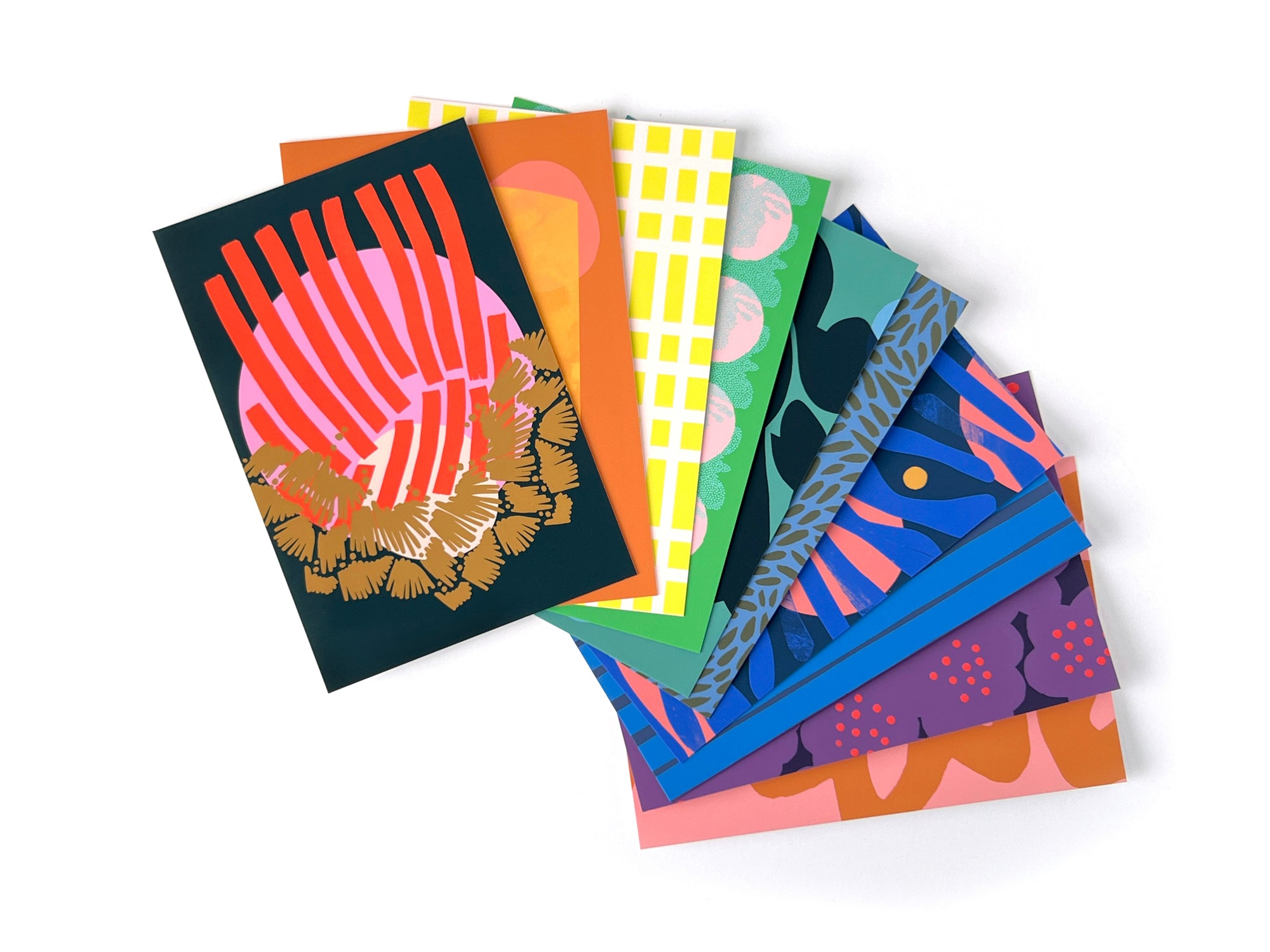 Pack of 10 colorful postcards with various patterns on a white background, designed by artist Leila Simon Hayes.