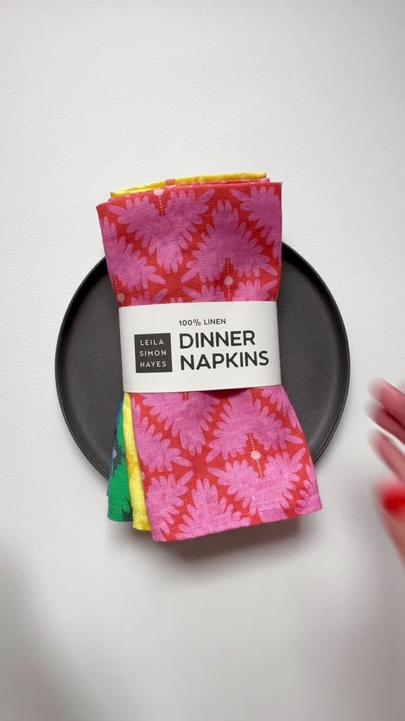Pack of 4 linen dinner napkins. Designed by artist Leila Simon Hayes. 